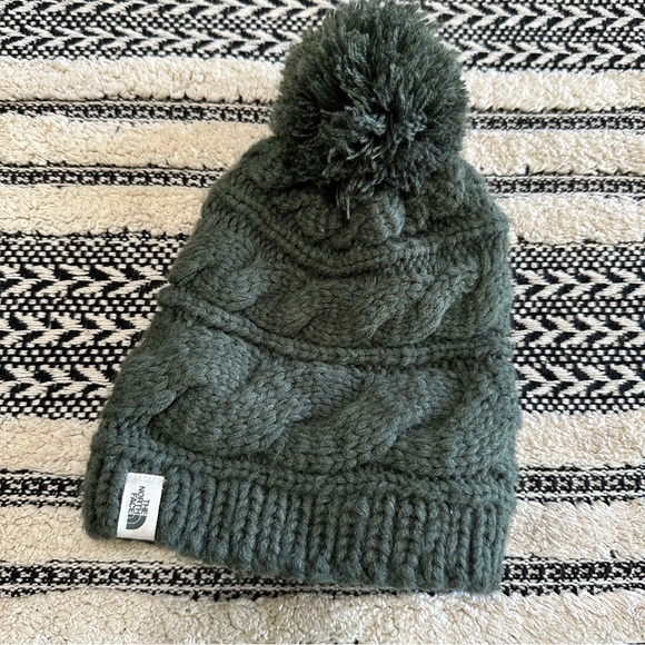 The North Face Accessories - The north face women’s cable knit beanie hat with Pom Pom one size green